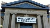 Adams Library with "Welcome to Your Library" sign