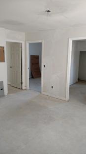 After room with painted white walls and clean floor