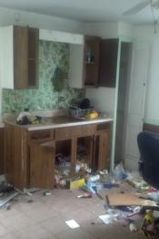 Before kitchen with garbage