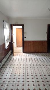 After room with fixed tile floors