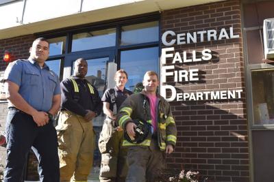 Firefighters in front of Central Falls Fire Department